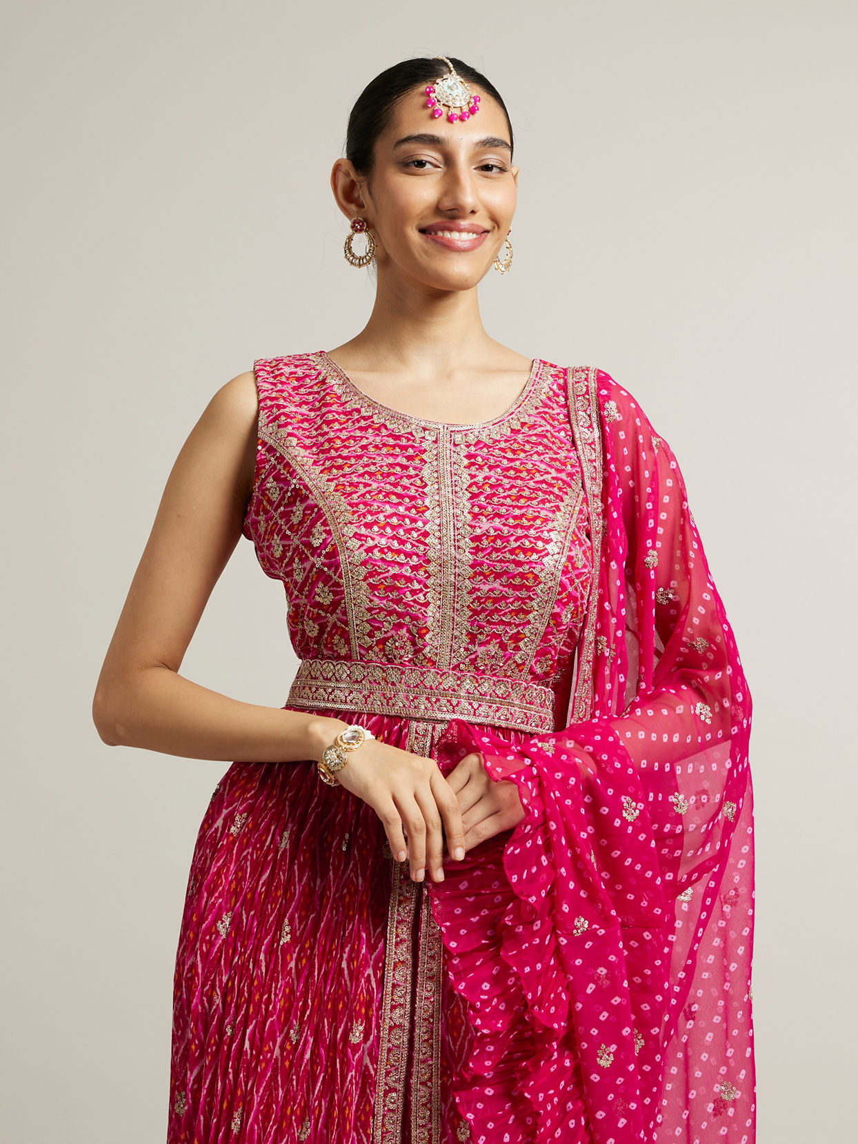 alt message - Mohey Women Rani Pink Bandhani Long Suit with Gota Patti Work image number 1