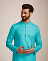 alt message - Manyavar Men Light Blue Plain Kurta Set image number 0