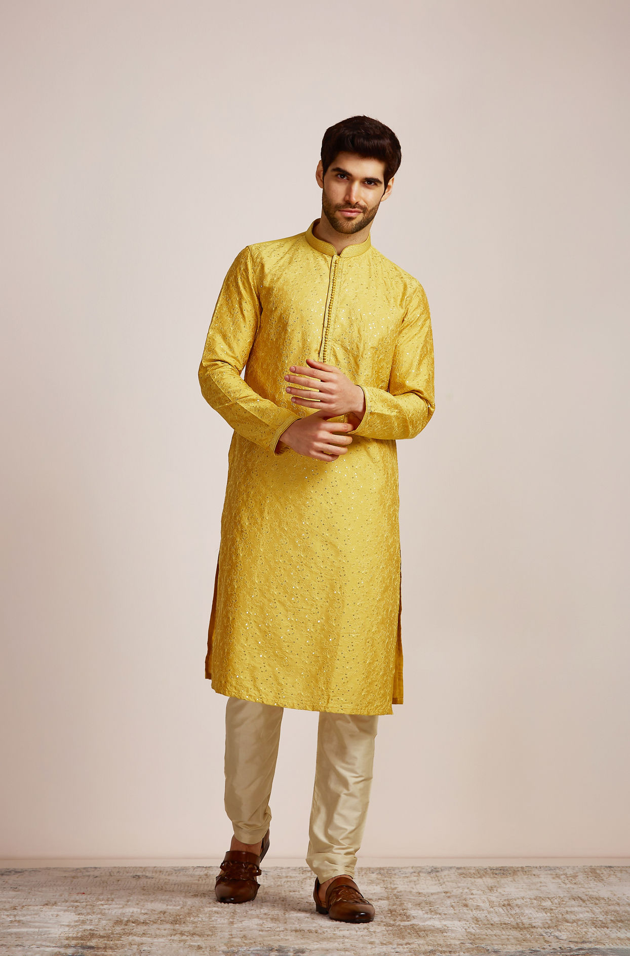 alt message - Manyavar Men Mustard Yellow Sequined Kurta Set image number 1