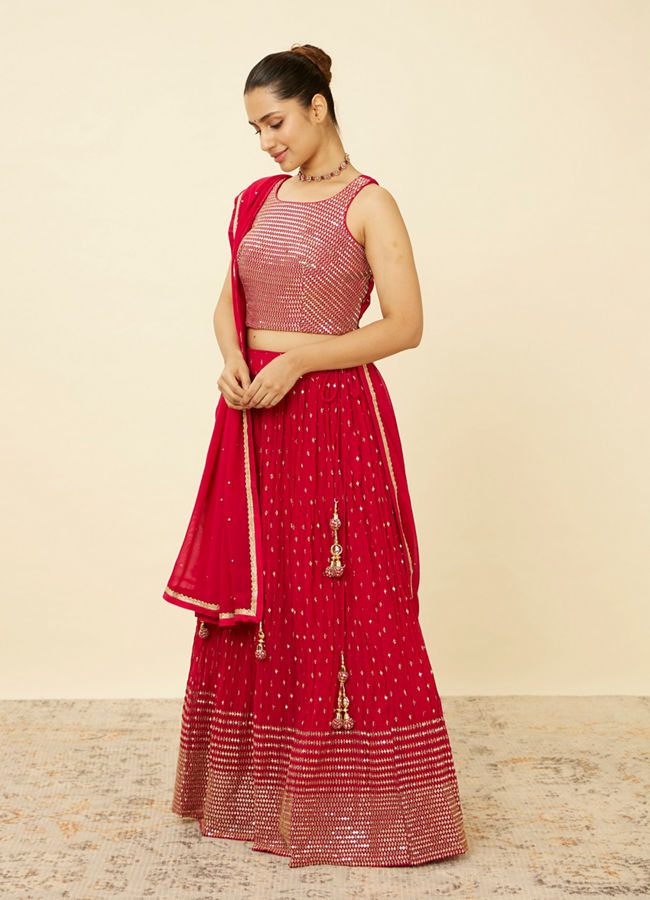 alt message - Mohey Women Fiesta Red Sequined Lehenga image number 3