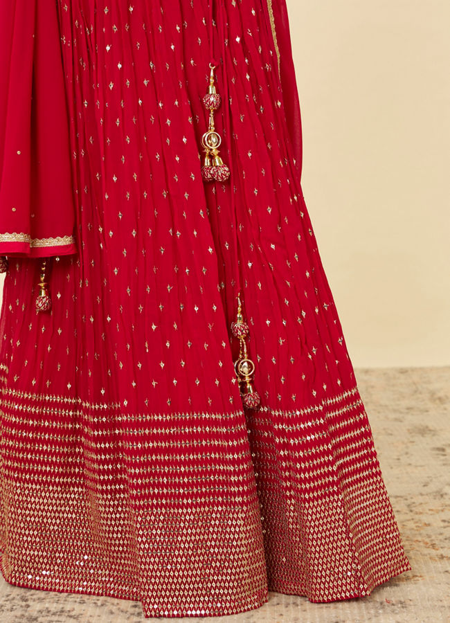 alt message - Mohey Women Fiesta Red Sequined Lehenga image number 2