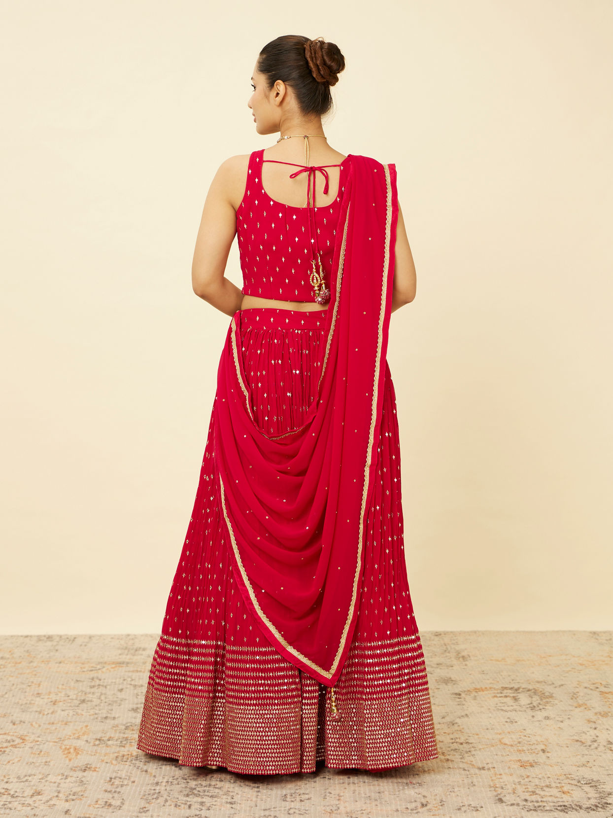 alt message - Mohey Women Fiesta Red Sequined Lehenga image number 4