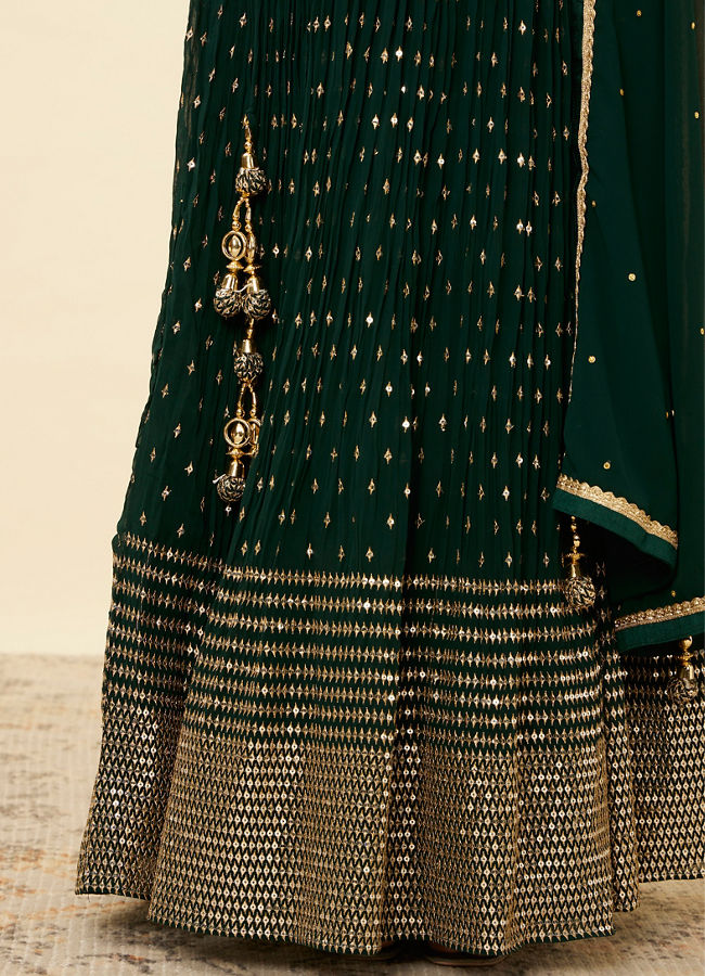 alt message - Mohey Women Forest Green Sequined Lehenga image number 2