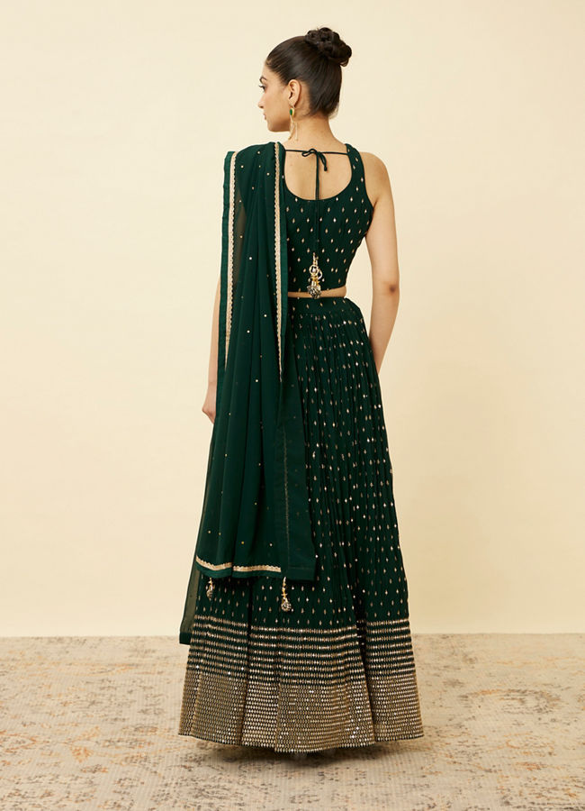 alt message - Mohey Women Forest Green Sequined Lehenga image number 4