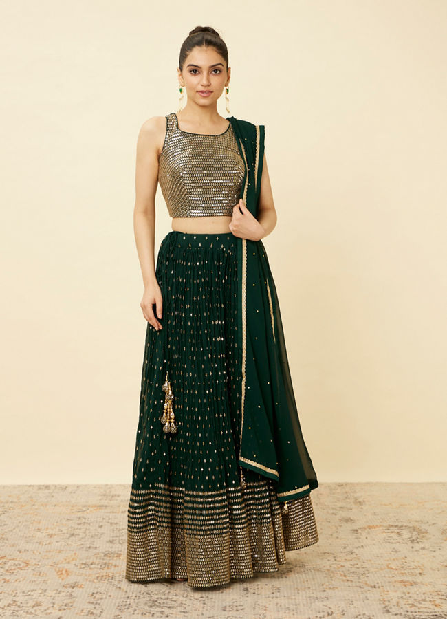 alt message - Mohey Women Forest Green Sequined Lehenga image number 0