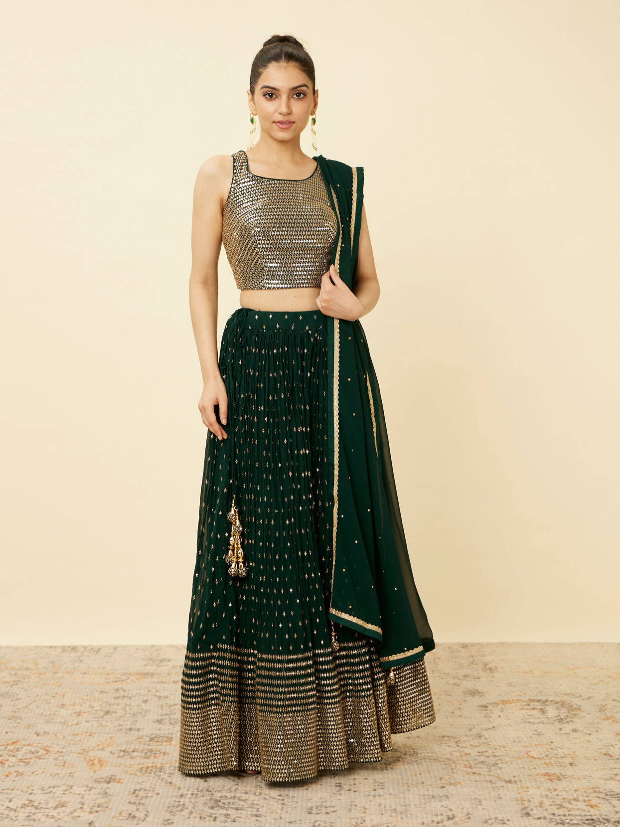 alt message - Mohey Women Forest Green Sequined Lehenga image number 0