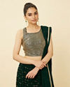 alt message - Mohey Women Forest Green Sequined Lehenga image number 1