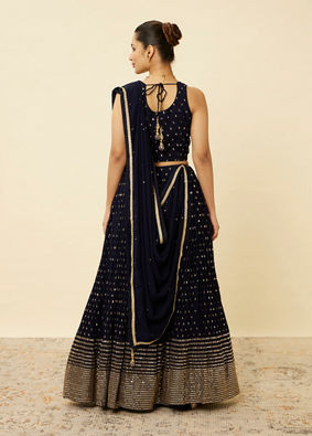 alt message - Mohey Women Indigo Blue Sequined Lehenga image number 4