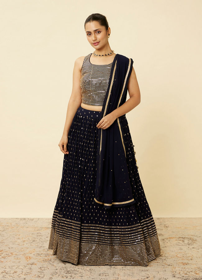 alt message - Mohey Women Indigo Blue Sequined Lehenga image number 0