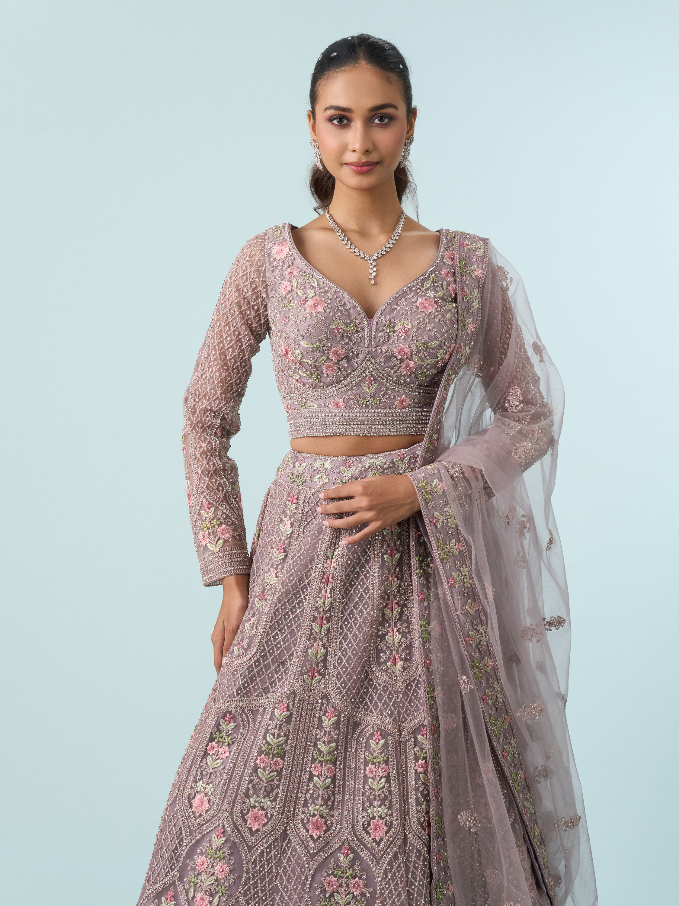 Mohey Women Enthralling Purple Net Lehenga
