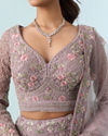 Mohey Women Enthralling Purple Net Lehenga