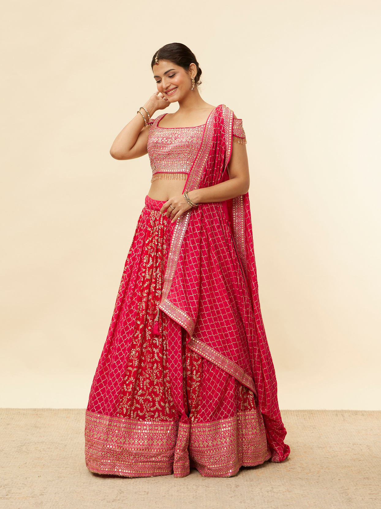 alt message - Mohey Women Berry Pink Sequined Jaal Patterned Lehenga image number 2