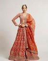 Mohey Women Rust Orange Floral Medallion Patterned Bridal Lehenga with Bel Buti Embroidery on Blouse image number 0