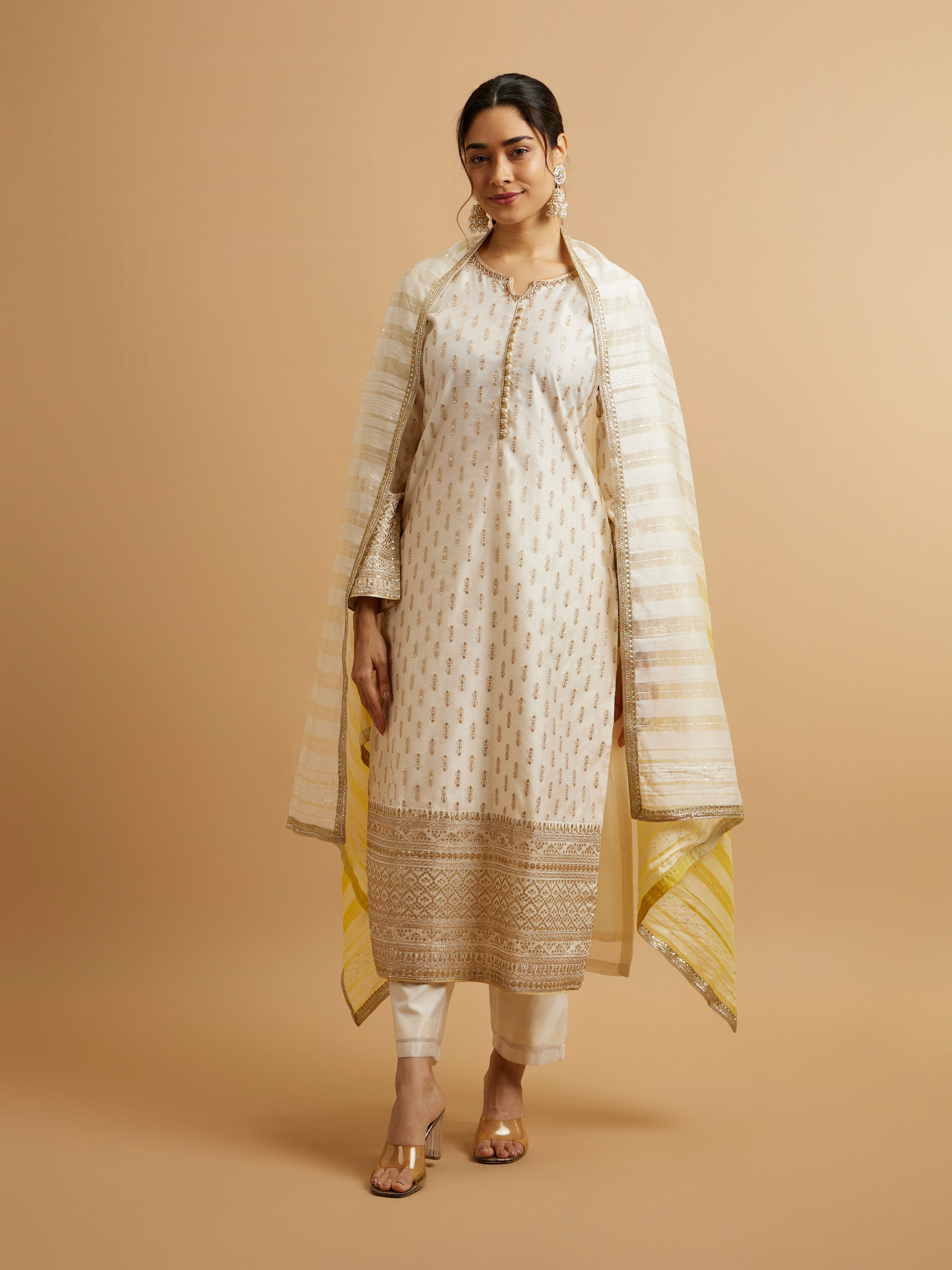 Mohey Women Cream Buta Sequinned Stitched Suit with Bandhani Dupatta