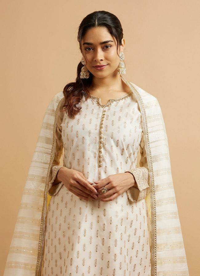 alt message - Mohey Women Cream Buta Sequinned Stitched Suit with Bandhani Dupatta image number 1