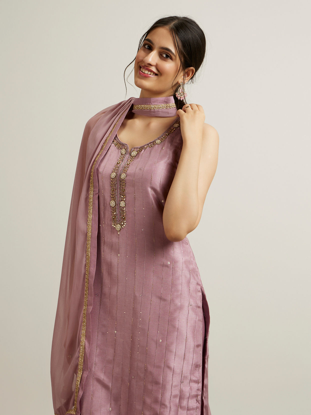 alt message - Mohey Women Purple Stripe Patterned Stitched Suit with Stone Embellishments image number 1