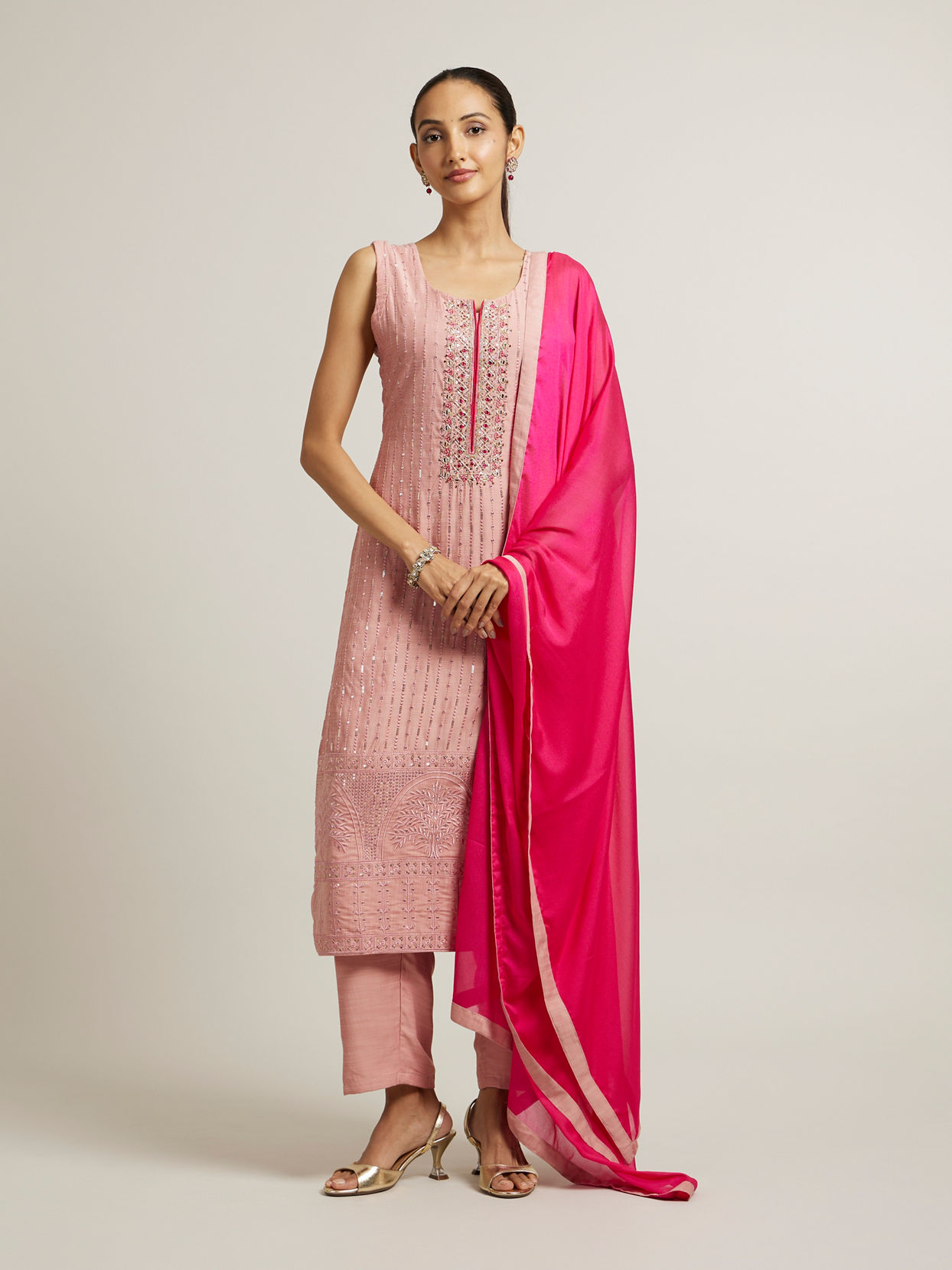 alt message - Mohey Women Light Pink Stitched Suit with Mirror & Sequin Embellishments image number 0