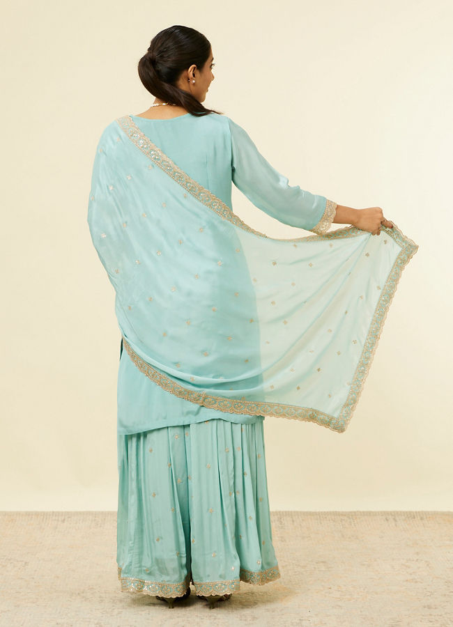 alt message - Mohey Women Light Blue Bel Buti Jaal Patterned Palazzo Suit image number 4