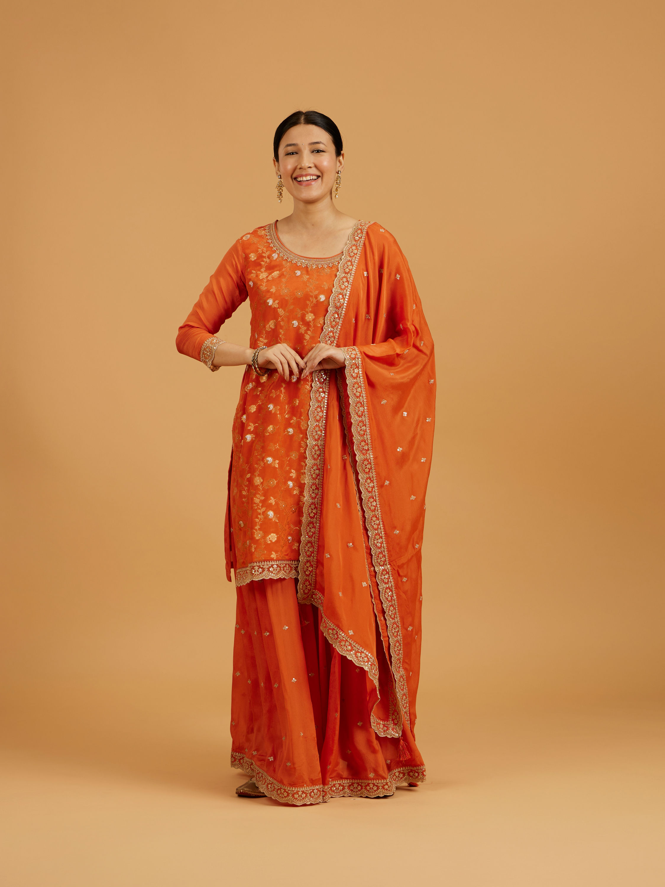 Mohey Women Pumpkin Orange Bel Buti Patterned Palazzo Suit with Floral Butas