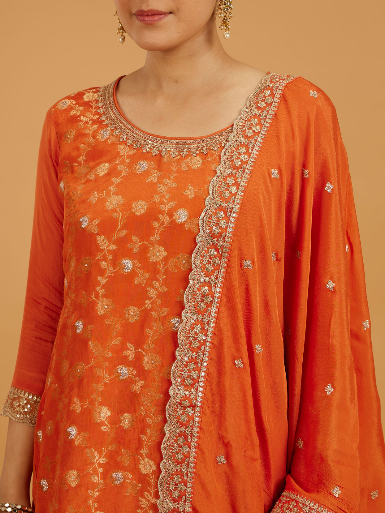 Mohey Women Pumpkin Orange Bel Buti Patterned Palazzo Suit with Floral Butas