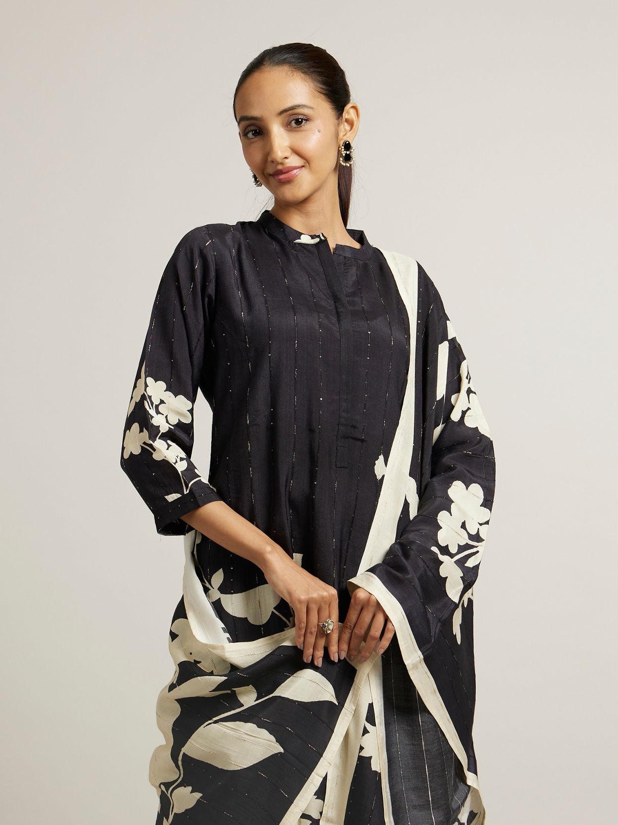 alt message - Mohey Women Ebony Black Floral Printed Stitched Suit image number 1