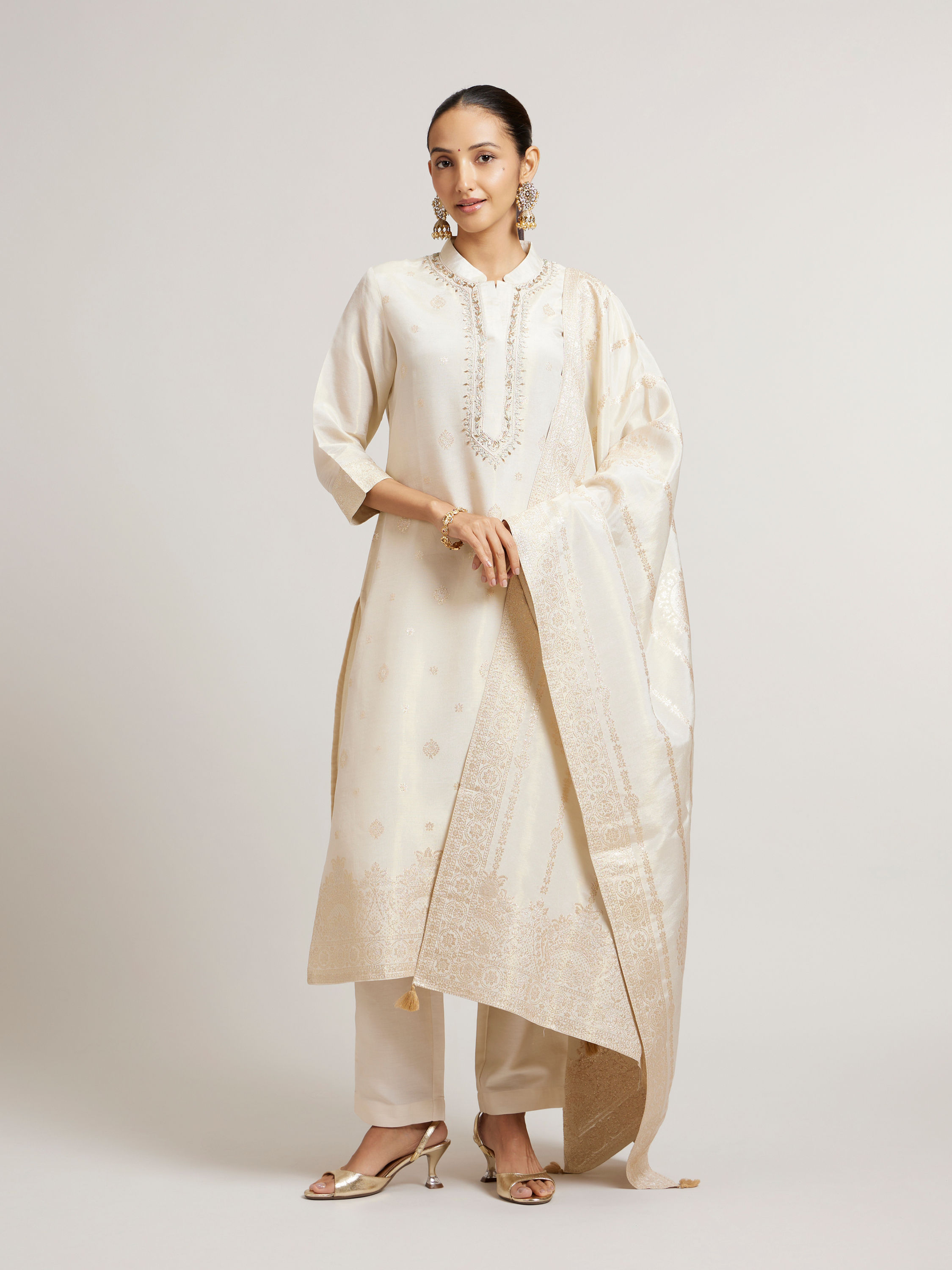 Mohey Women Soft Cream Straight Suit Set with Buta Pattern in Dull Gold Zari Work