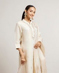 Mohey Women Soft Cream Straight Suit Set with Buta Pattern in Dull Gold Zari Work