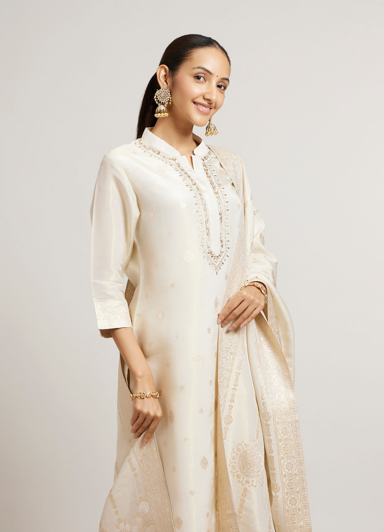Mohey Women Soft Cream Straight Suit Set with Buta Pattern in Dull Gold Zari Work