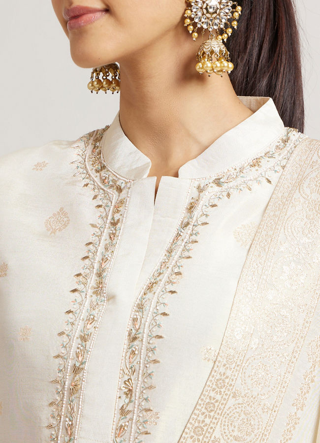 Mohey Women Soft Cream Straight Suit Set with Buta Pattern in Dull Gold Zari Work