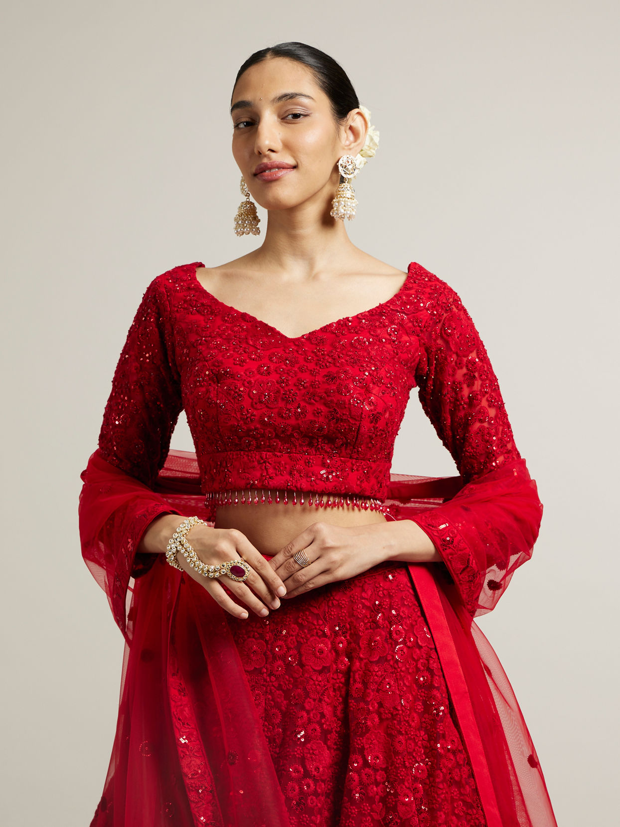 alt message - Mohey Women Ruby Red Floral Embroidered Crop Top Lehenga image number 1