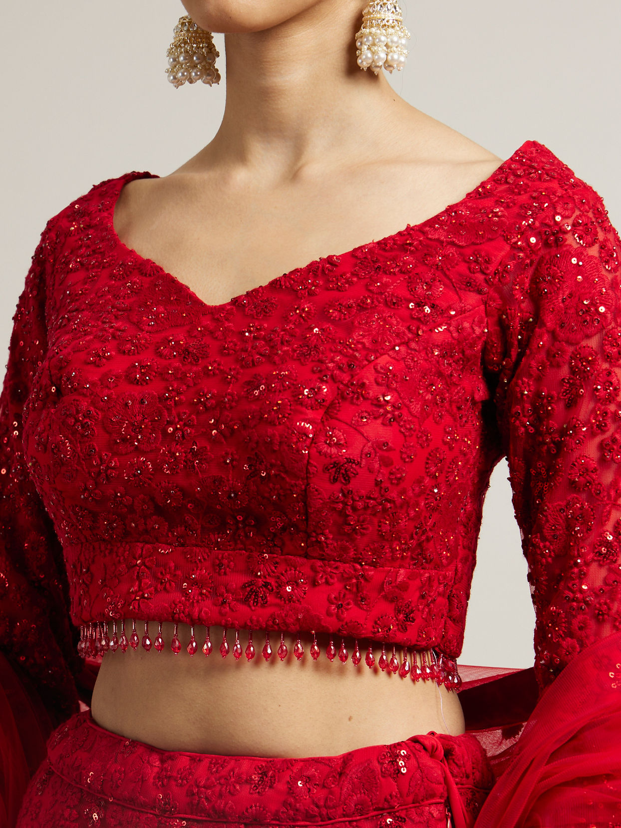 alt message - Mohey Women Ruby Red Floral Embroidered Crop Top Lehenga image number 3