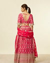 alt message - Mohey Women Rani Pink Imperial Floral Buta Patterned Lehenga Lehenga with Mirror work image number 3