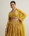 alt message - Mohey Women Glistening Yellow Radiance Lehenga image number 1