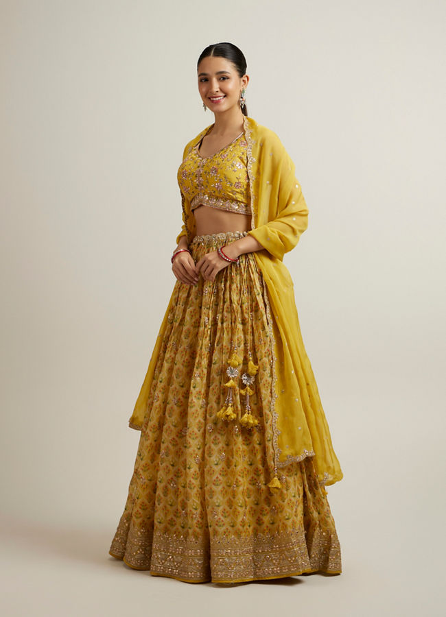 alt message - Mohey Women Glistening Yellow Radiance Lehenga image number 2