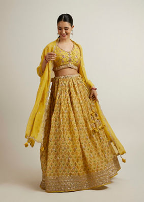 alt message - Mohey Women Glistening Yellow Radiance Lehenga image number 0