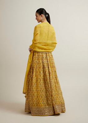 alt message - Mohey Women Glistening Yellow Radiance Lehenga image number 4