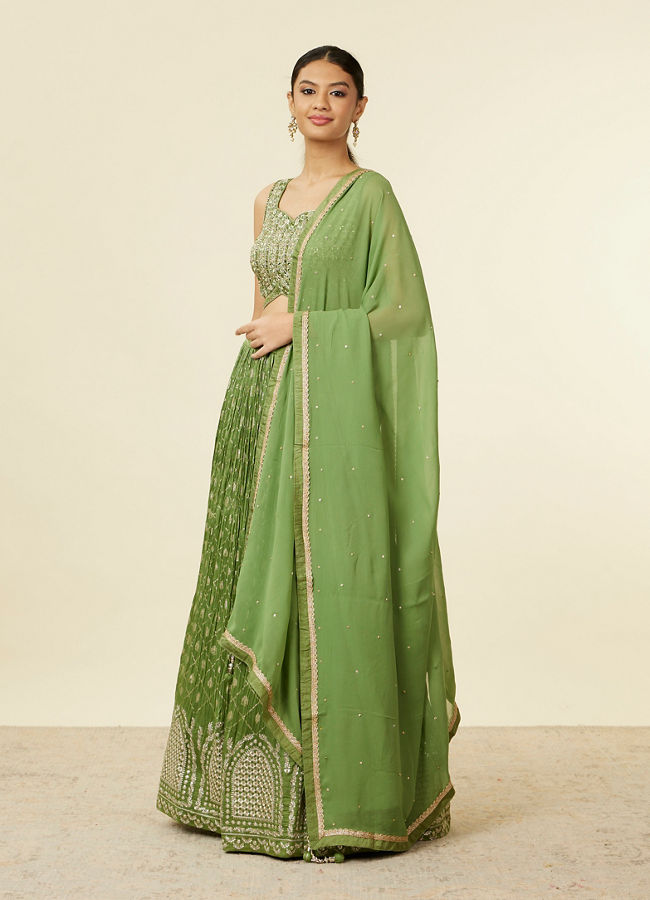 alt message - Mohey Women Green Art Silk Lehenga with Mirror Work image number 1