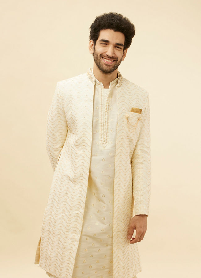 alt message - Manyavar Men Custard White Wave Patterned Sherwani Set image number 0