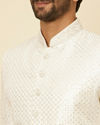 alt message - Manyavar Men Warm White Sequined Sherwani Set image number 1