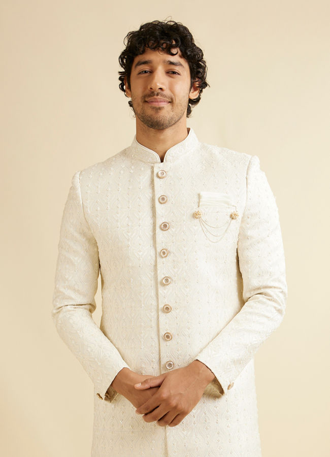 alt message - Manyavar Men Warm White Ogee Jaal Patterned Sherwani Set image number 0