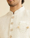 alt message - Manyavar Men Warm White Ogee Jaal Patterned Sherwani Set image number 1