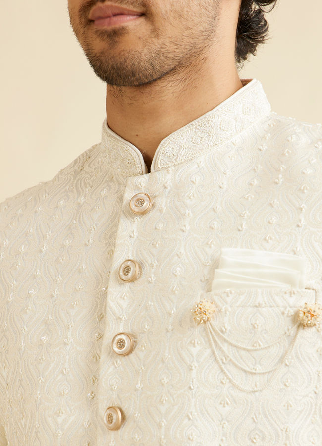 alt message - Manyavar Men Warm White Ogee Jaal Patterned Sherwani Set image number 1