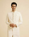 alt message - Manyavar Men Cream Jaal Patterned Sherwani Set image number 0