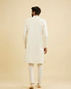 Manyavar Men Warm White Ogee Patterned Sherwani Set with Embellished Collar