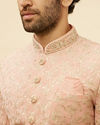 alt message - Manyavar Men Conch Shell Pink Floral Patterned Sherwani Set image number 1