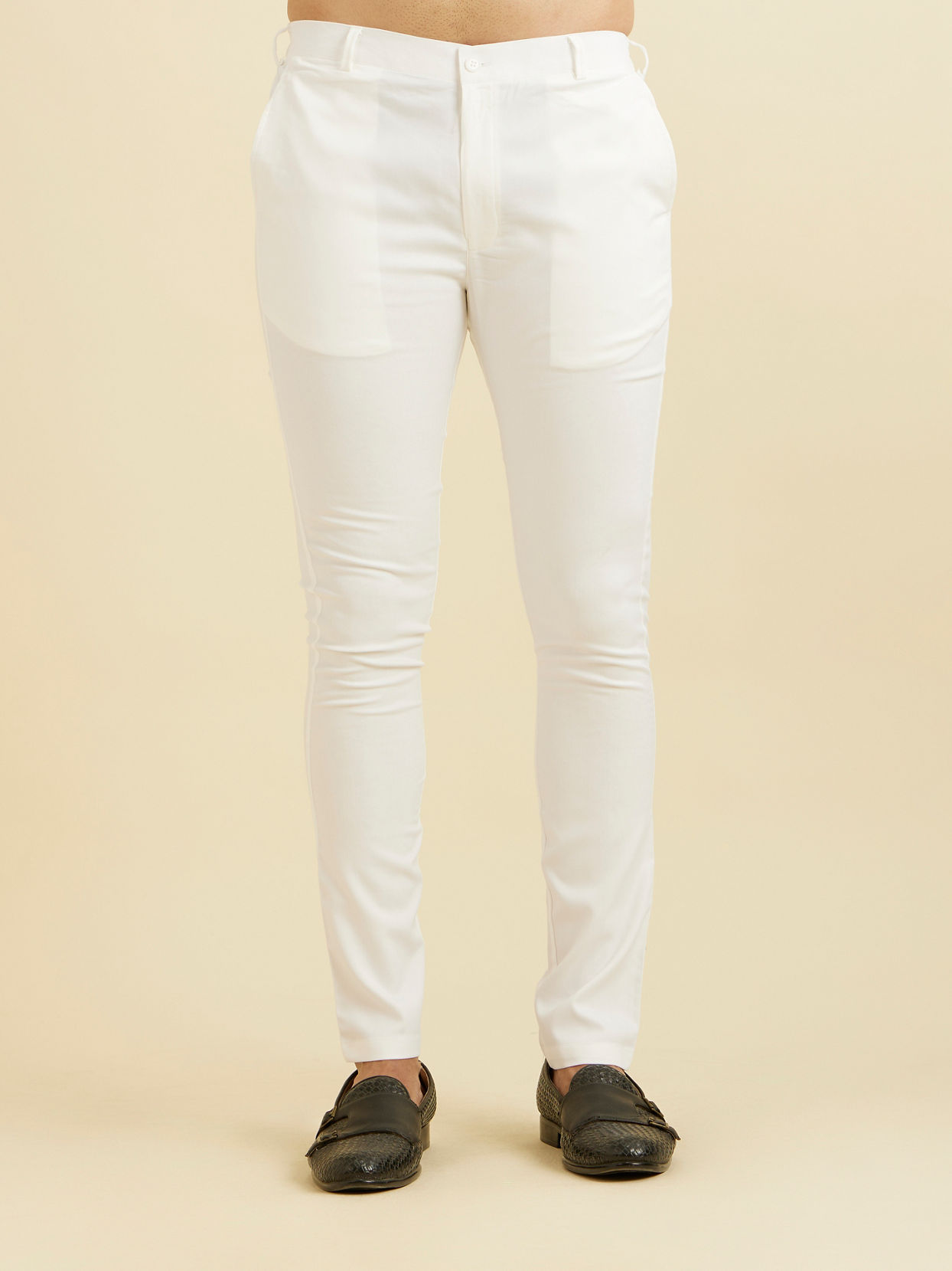 alt message - Manyavar Men Cloud White Pencil Cut Trousers image number 0