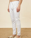 alt message - Manyavar Men Daisy White Pencil Cut Pajama image number 1