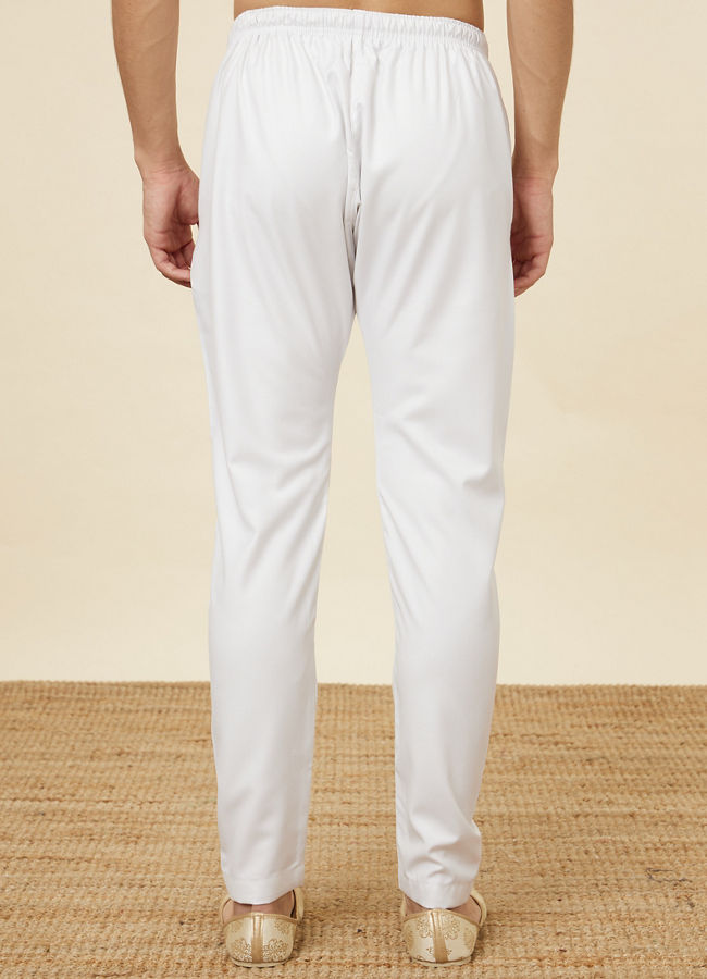 alt message - Manyavar Men Daisy White Pencil Cut Pajama image number 2