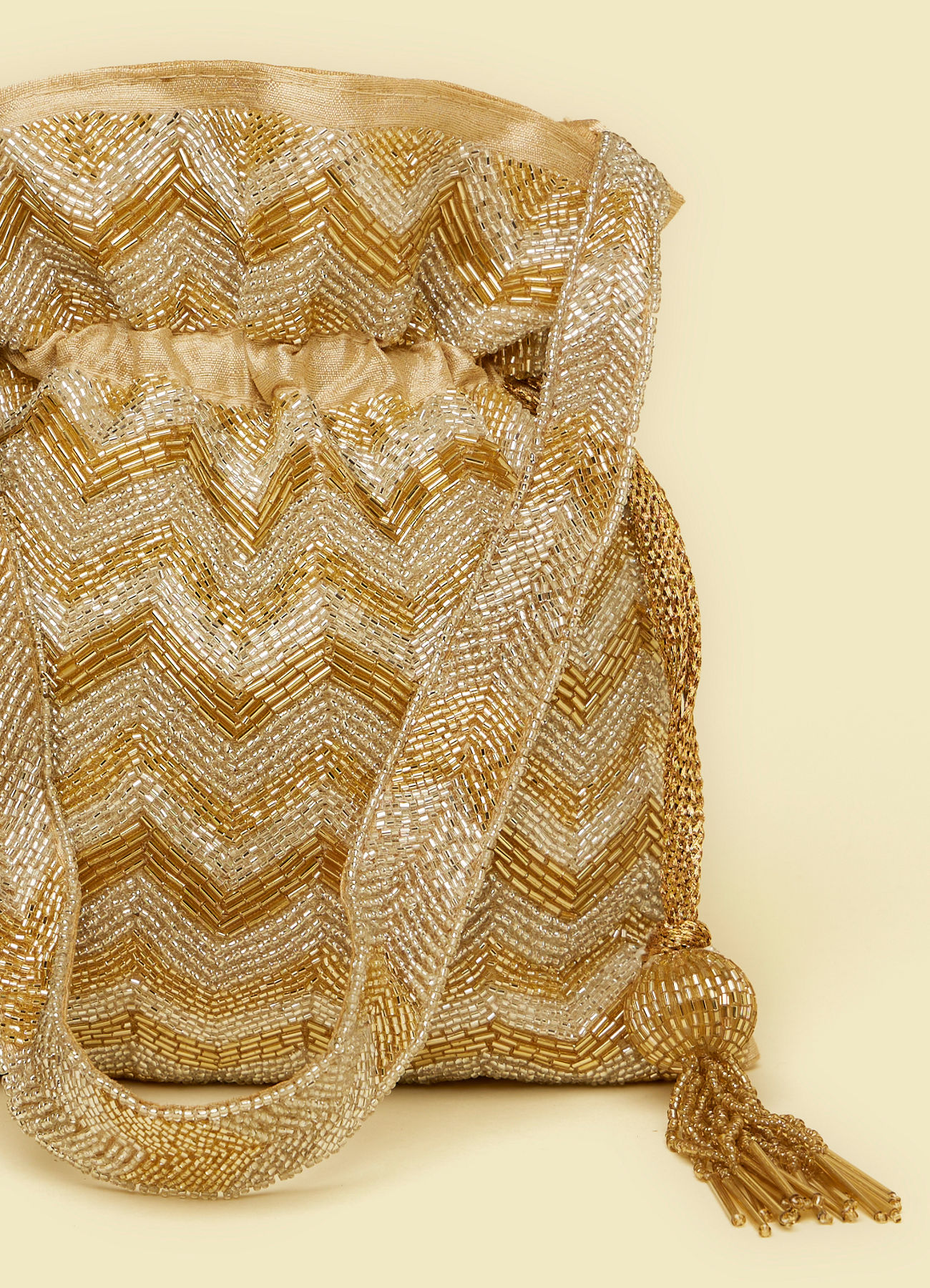 Mohey Women Beige Rhinestone Embellished Chevron Patterned Potli Bag