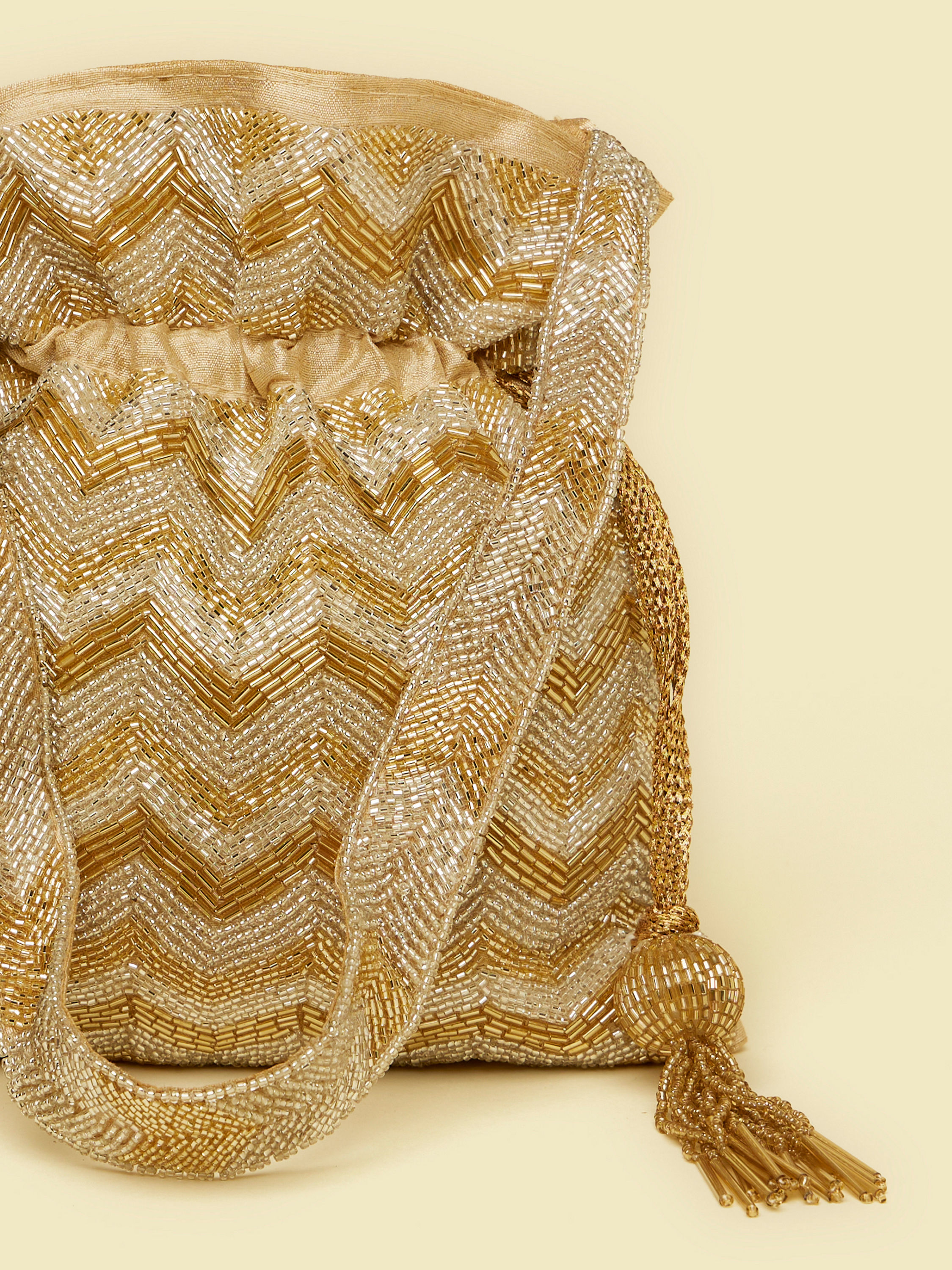 Mohey Women Beige Rhinestone Embellished Chevron Patterned Potli Bag